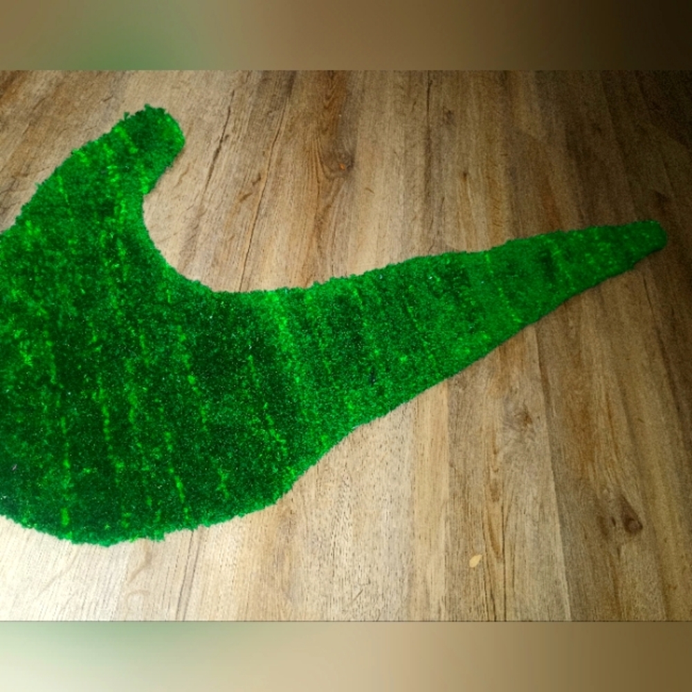 Green Nike swoosh rug available